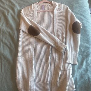 Women’s beige cardigan with brown elbow patches
